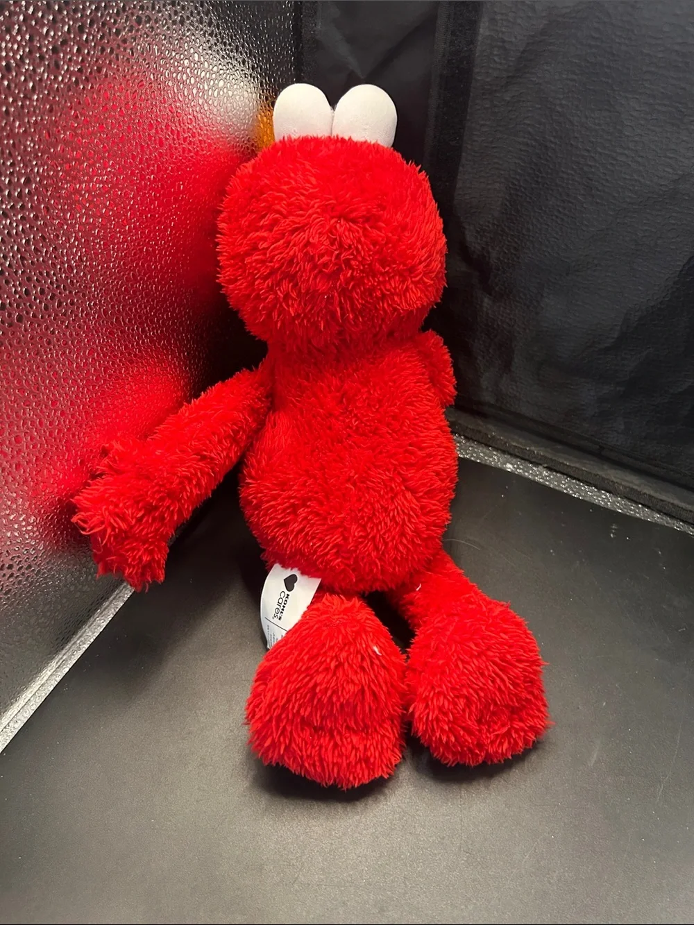 Kohl's Red Plush Elmo-Style Bird Toy with Orange Beak and White Eyes